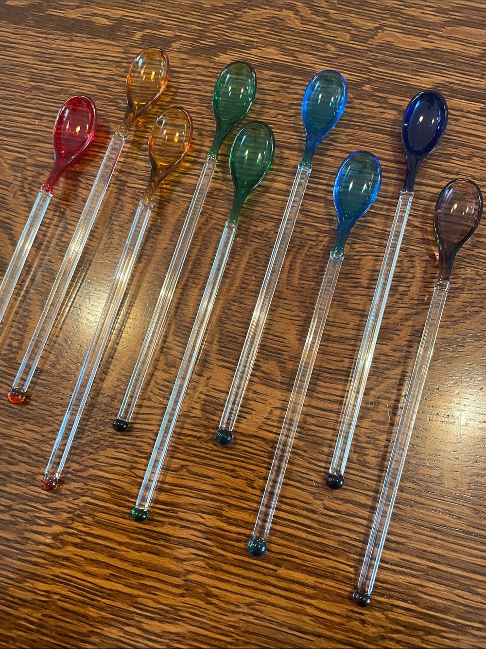 Set of 9 colorful glass spoons